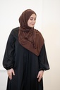 A brown cotton shawl with shiny gold beads throughout the entire shawl.