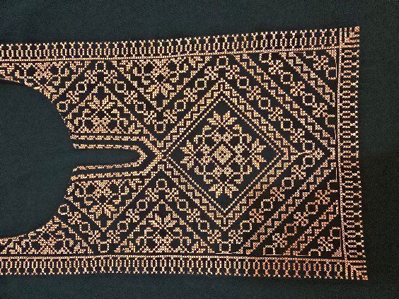 The Palestinian dome embroidery on the chest,