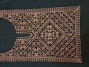 The Palestinian dome embroidery on the chest,