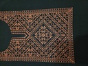 The Palestinian dome embroidery on the chest,