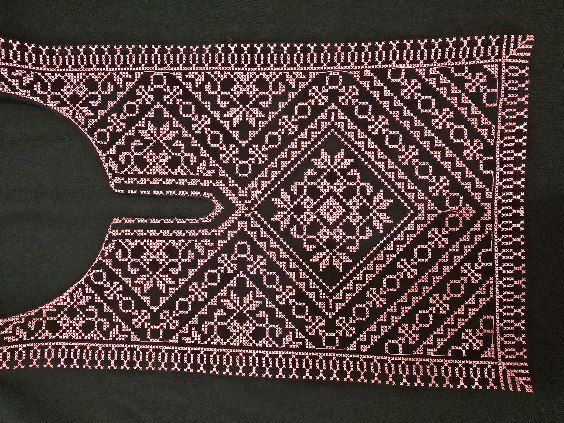 The Palestinian dome embroidery on the chest,