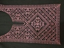 The Palestinian dome embroidery on the chest,